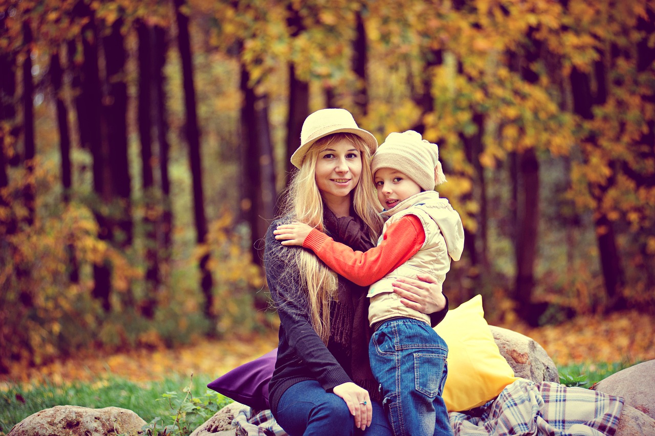 park autumn the child with his mother free photo