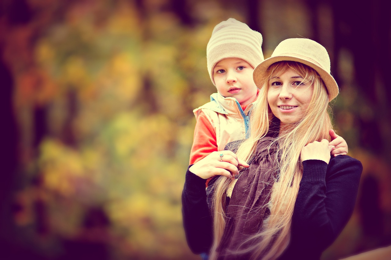 park autumn the child with his mother free photo