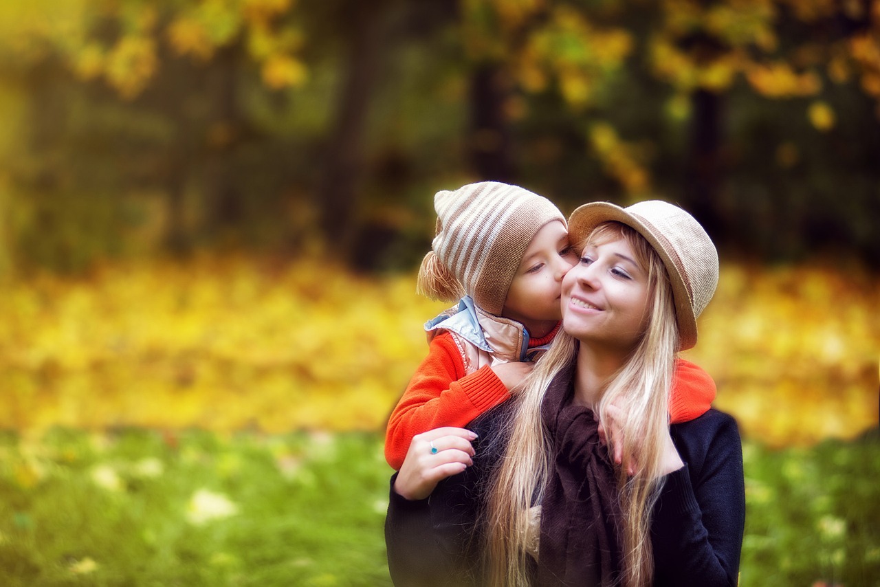park autumn the child with his mother free photo