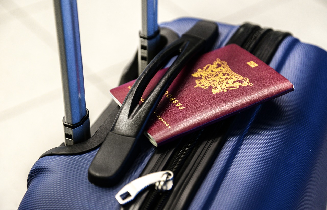 passport luggage trolley free photo