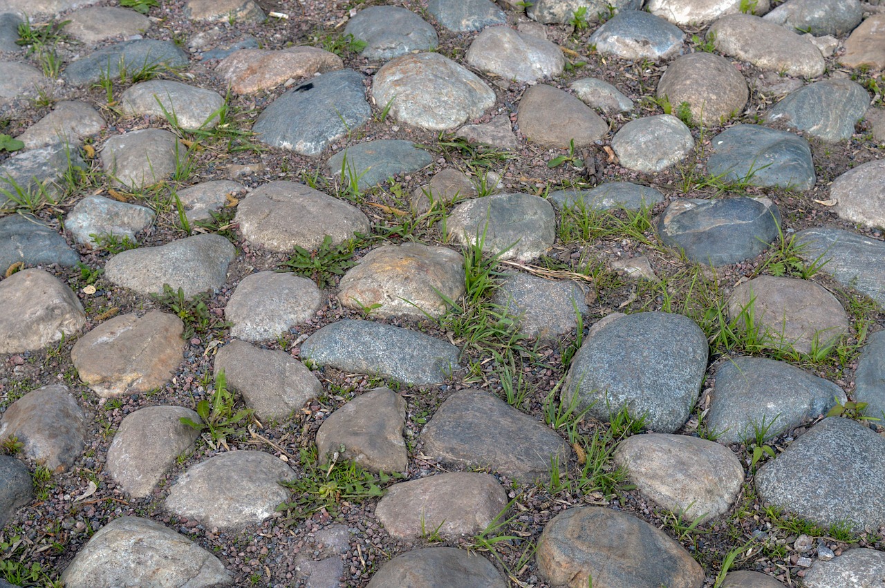 paved road cobblestones pavement free photo