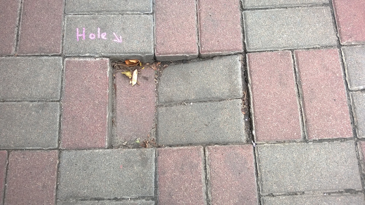 pavement hole warning free photo