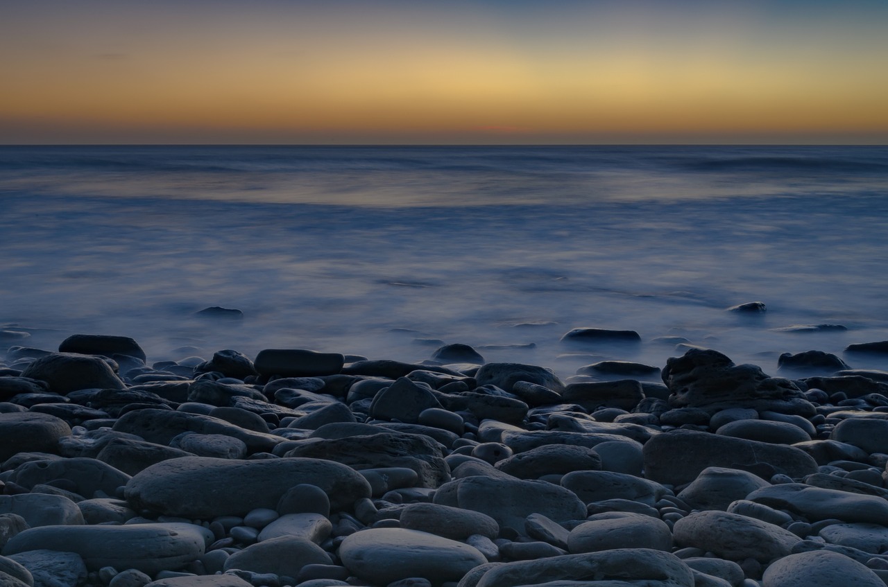 pebbles sea sunset free photo