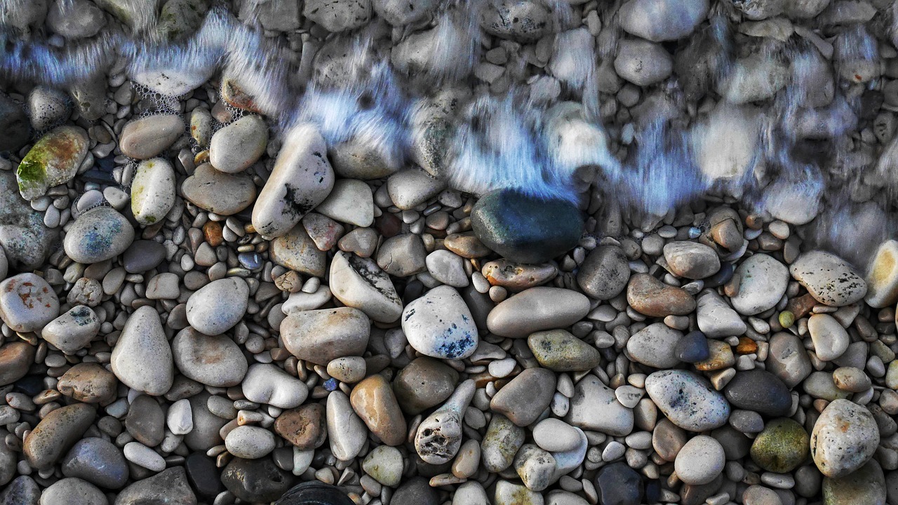 pebbles  the influx of  sea free photo