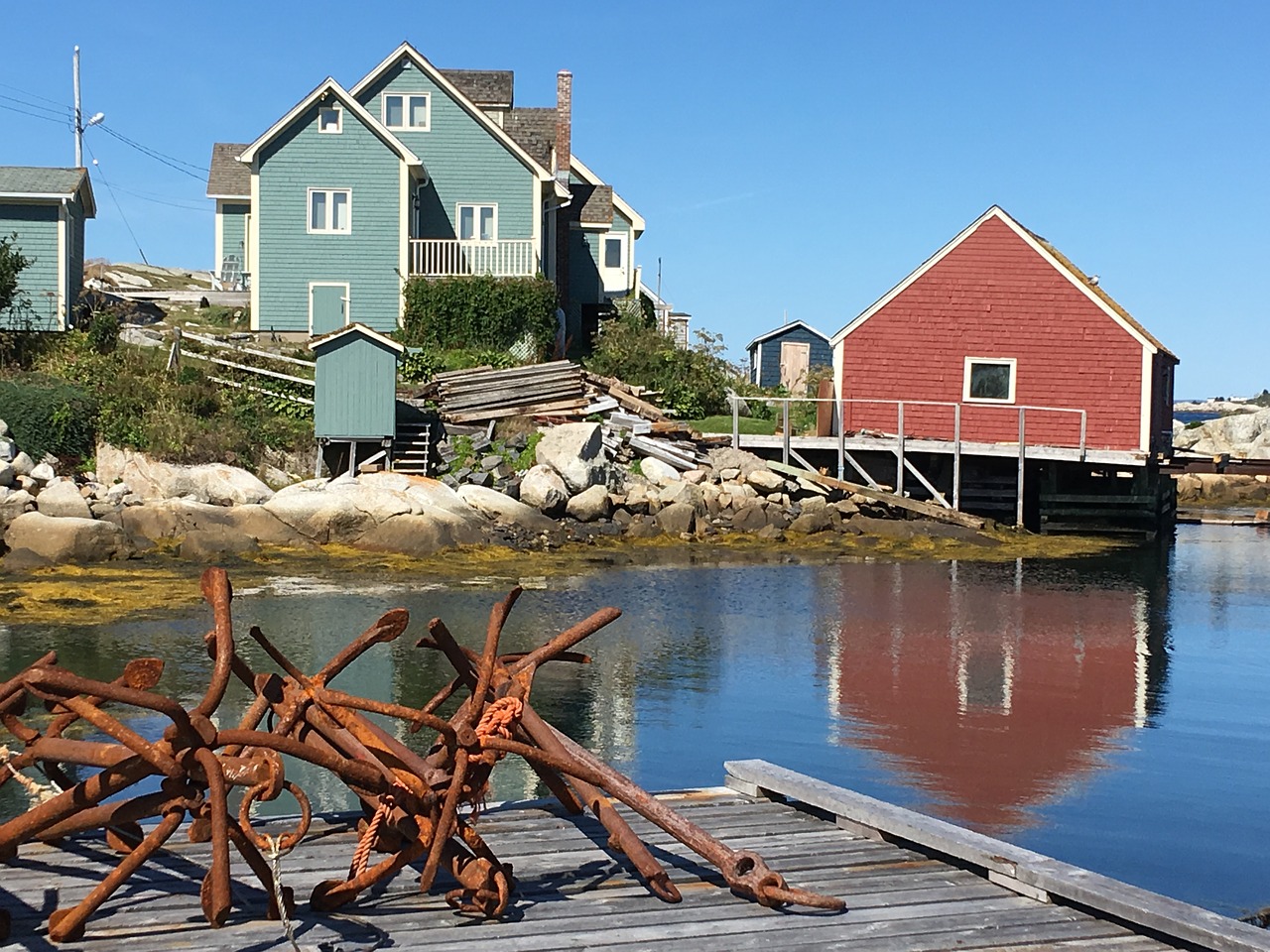 peggy s cove  rusty anchors  houses by water free photo