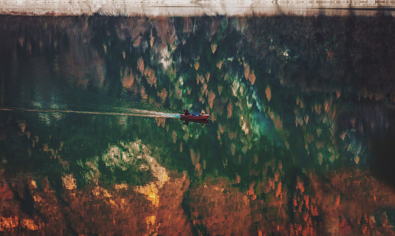 people boat reflection free photo