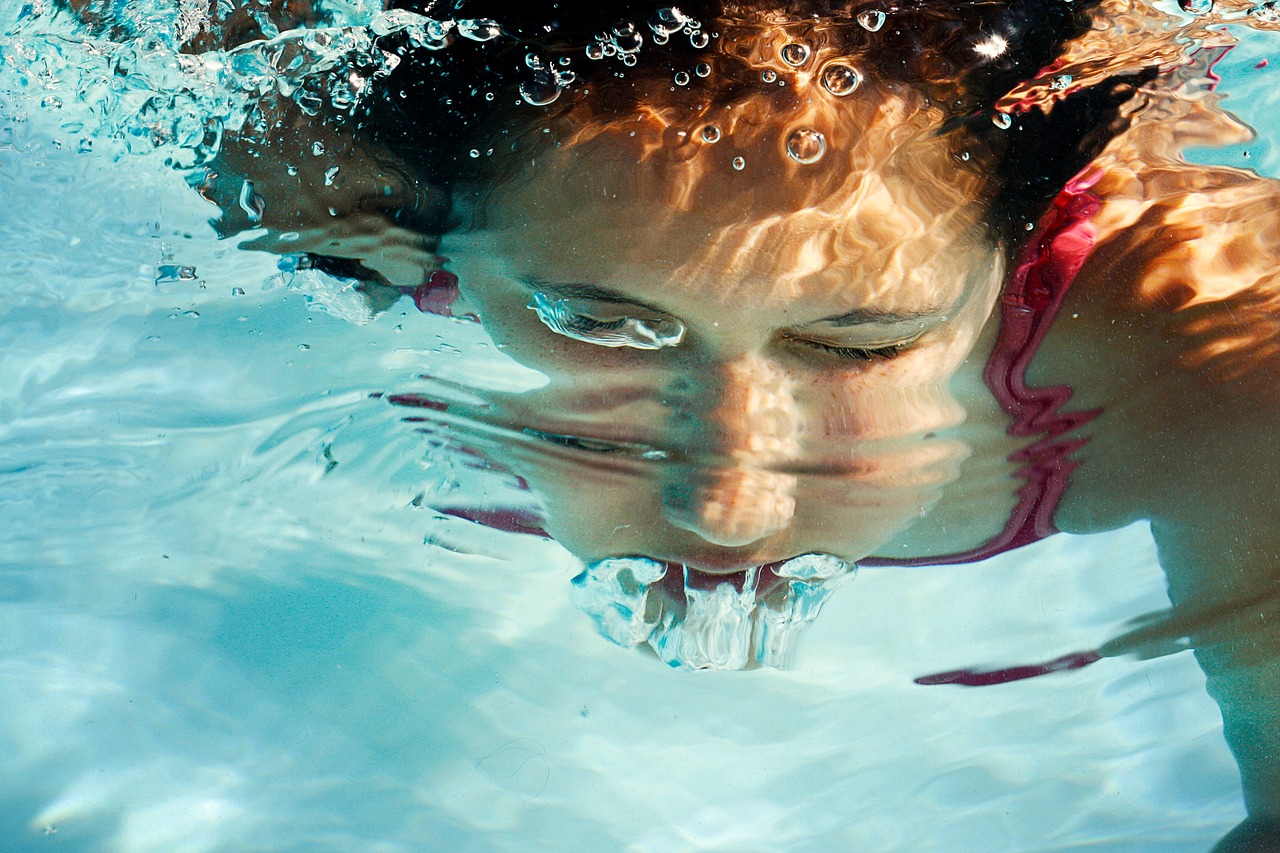 people woman swimming free photo