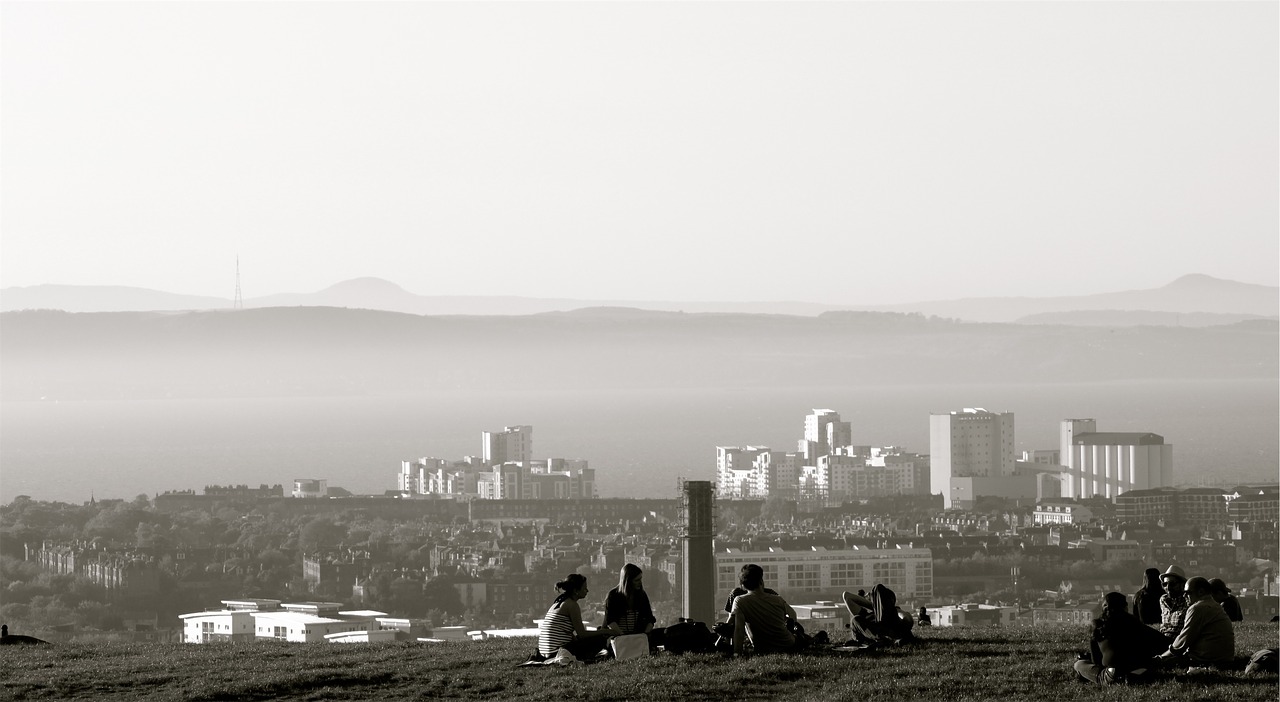 people sitting grass free photo