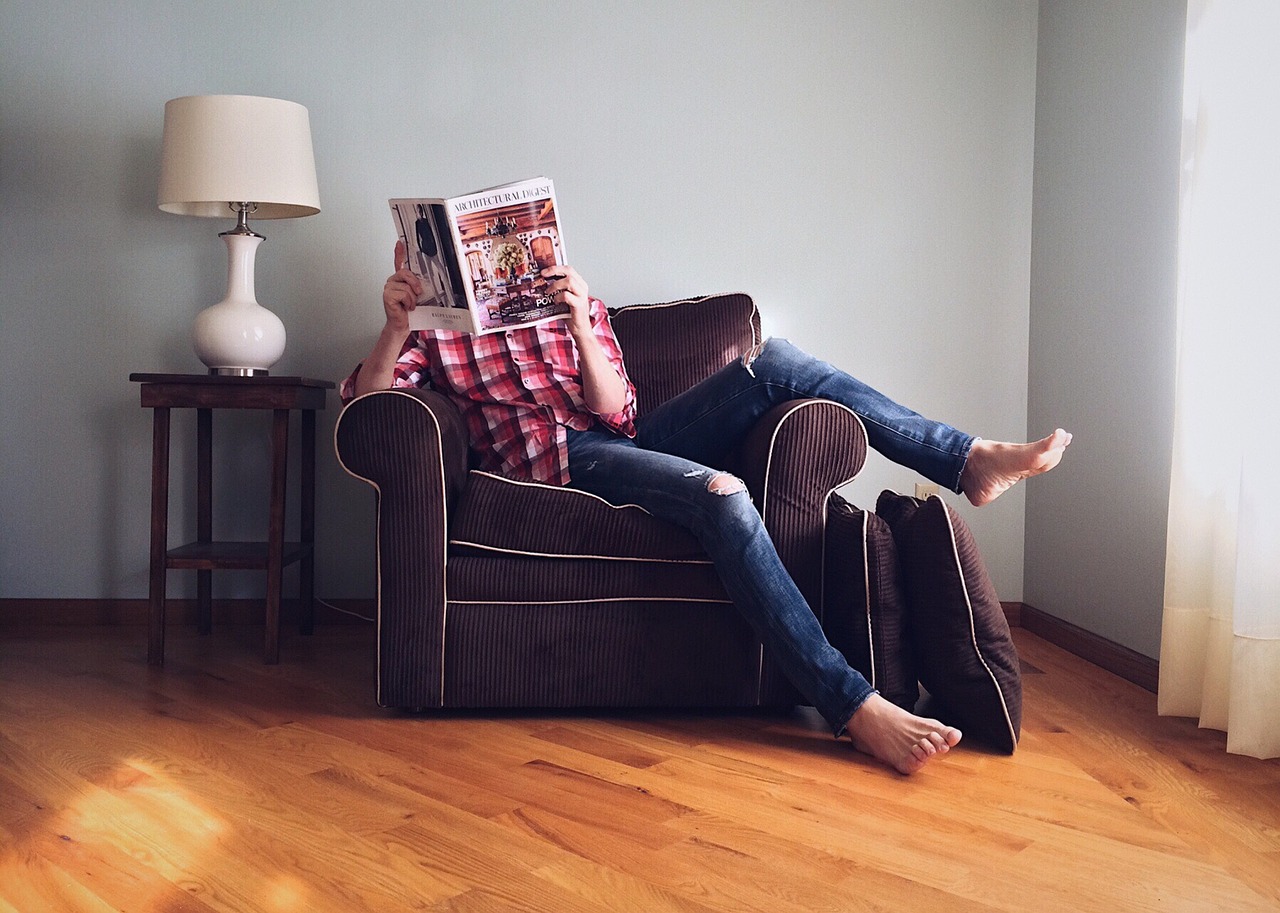 person reading home free photo