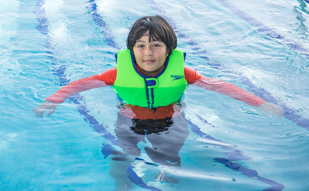 swimming life preserver boy free photo