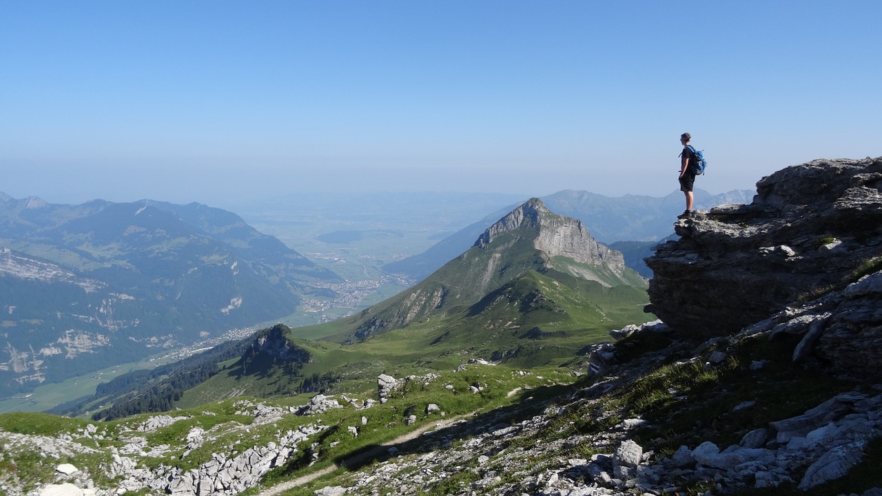 person cliff mountain free photo