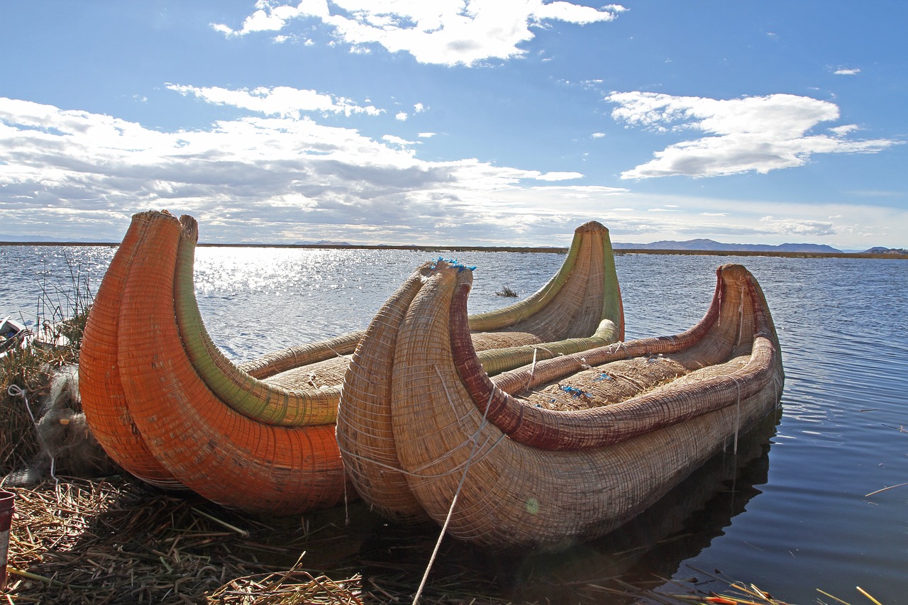 peru lake-titicaca canoes free photo
