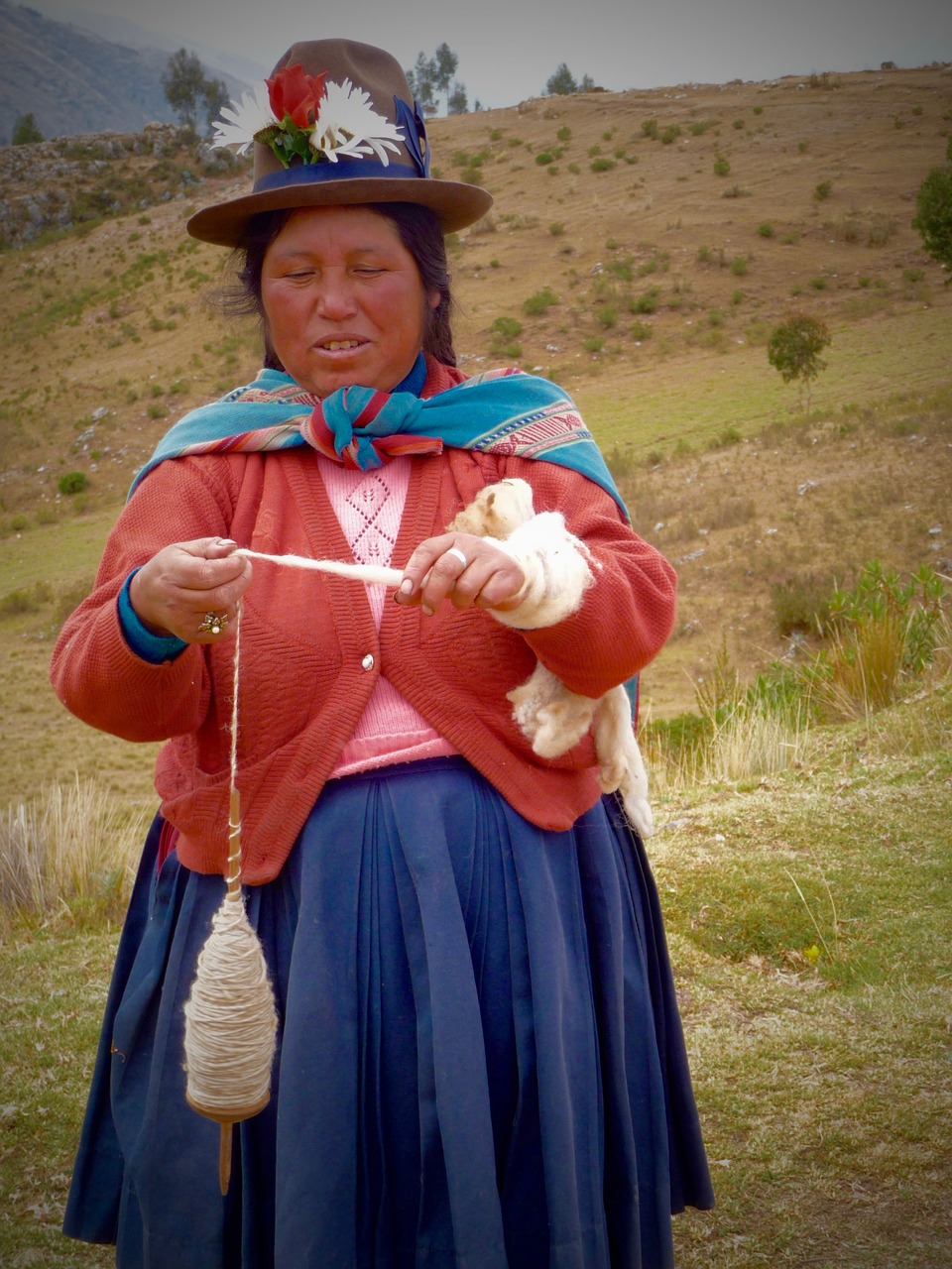 peruvian spinner traditional free photo