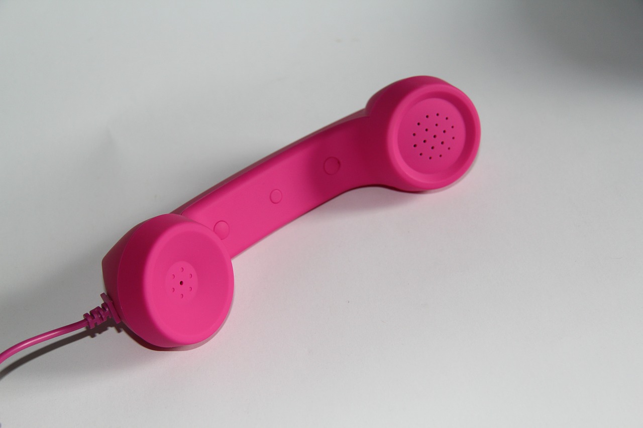 phone telephone handset pink free photo