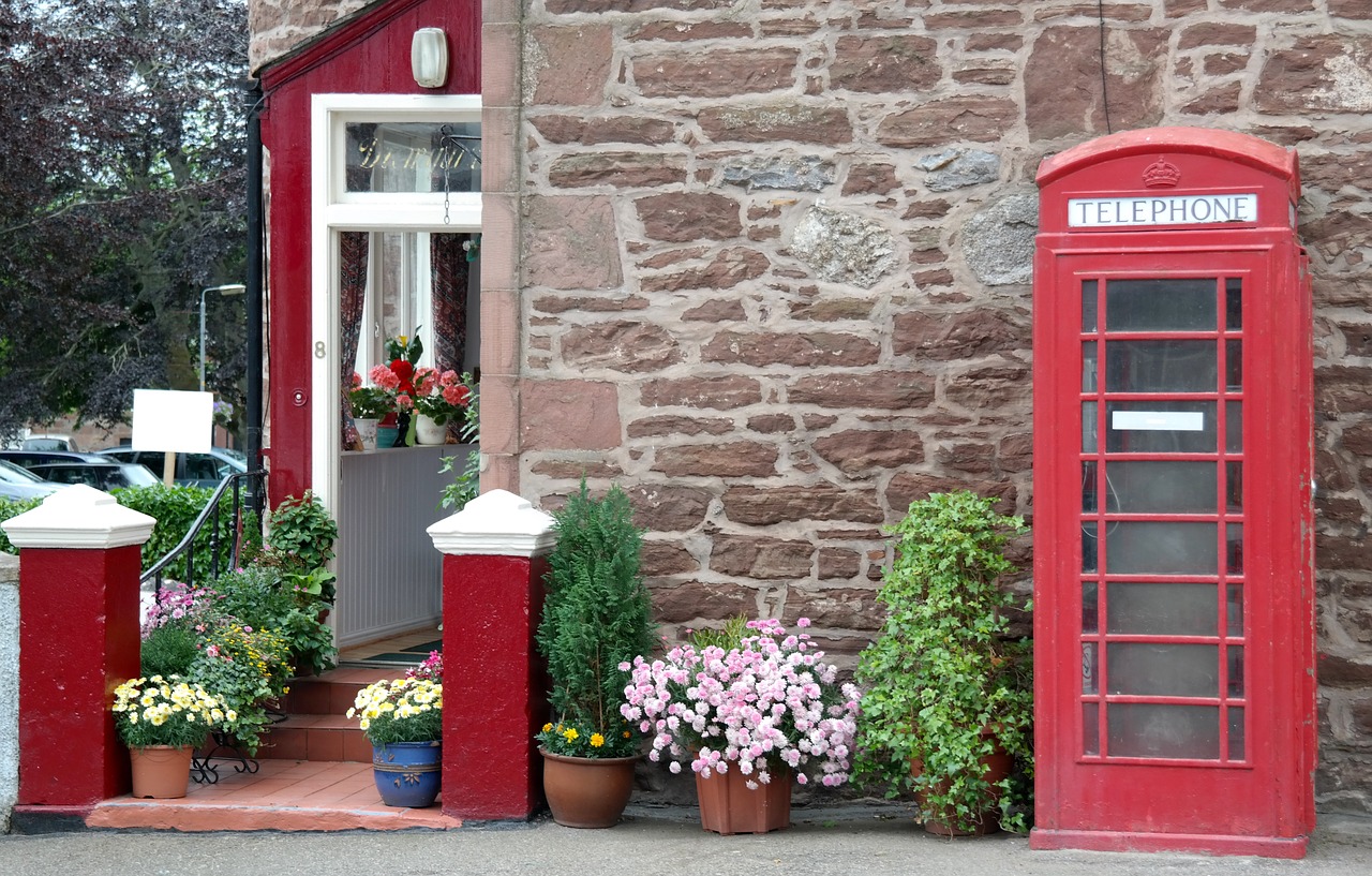 phone booth old house free photo