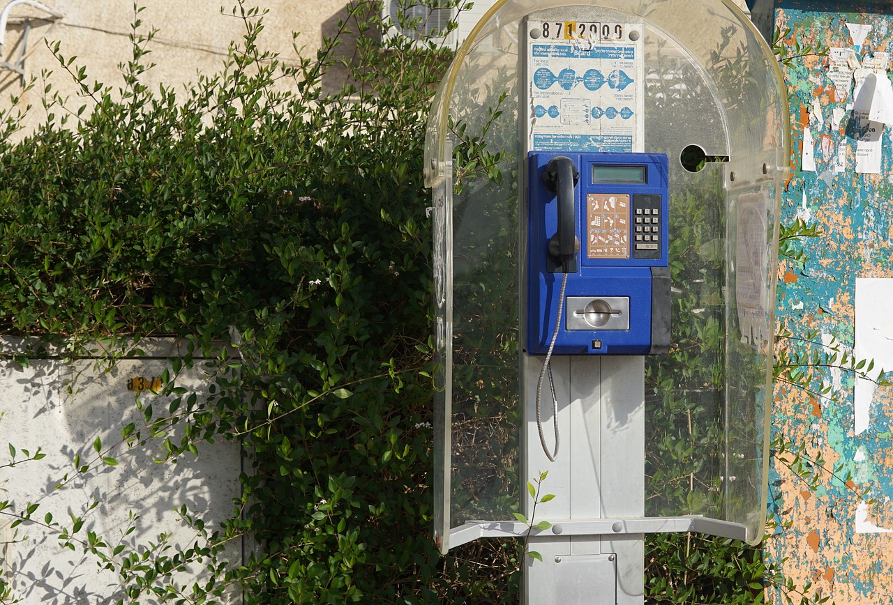 phone booth public telephone street phone free photo