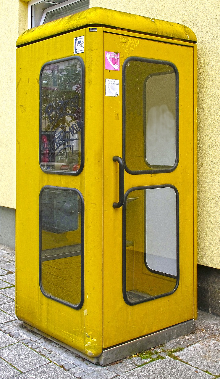 phone booth yellow antiquated free photo