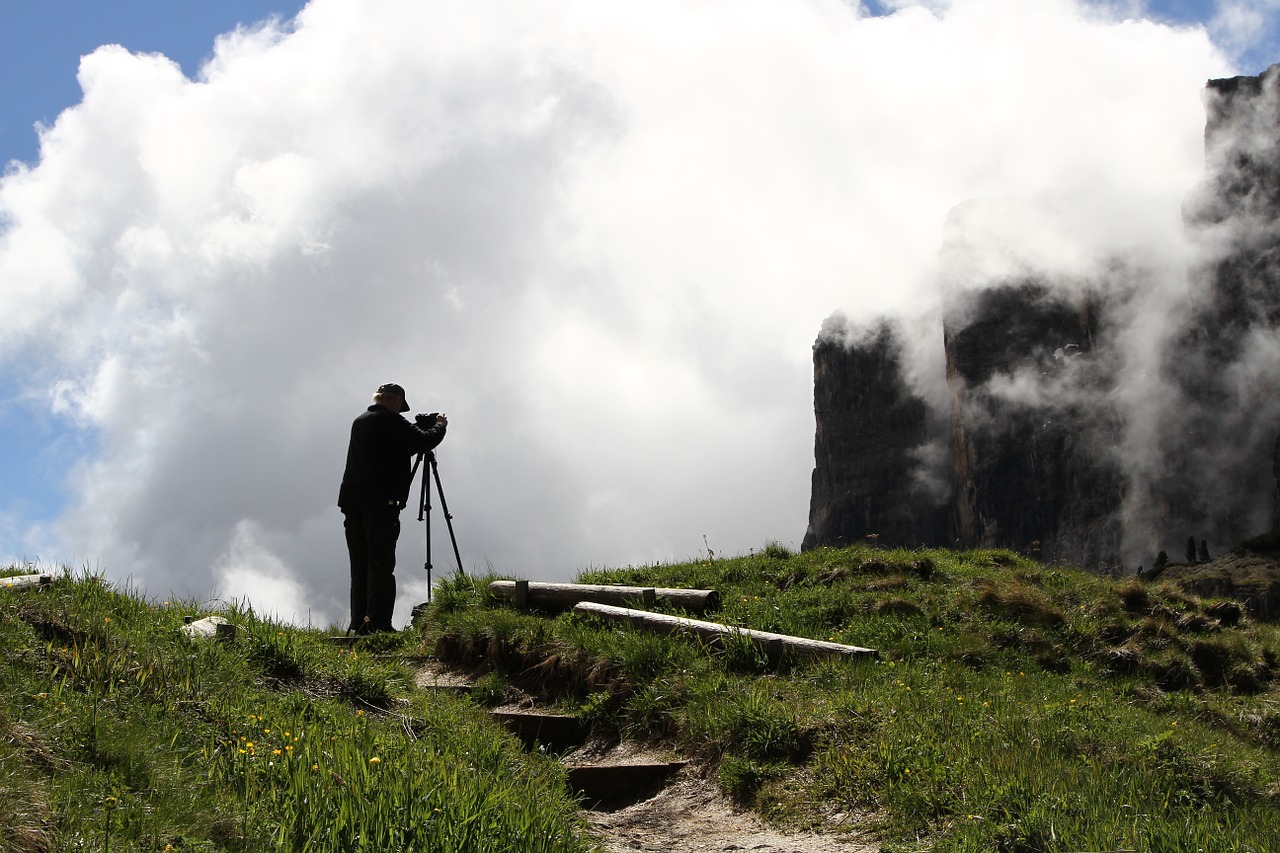 photographer clouds landscape free photo