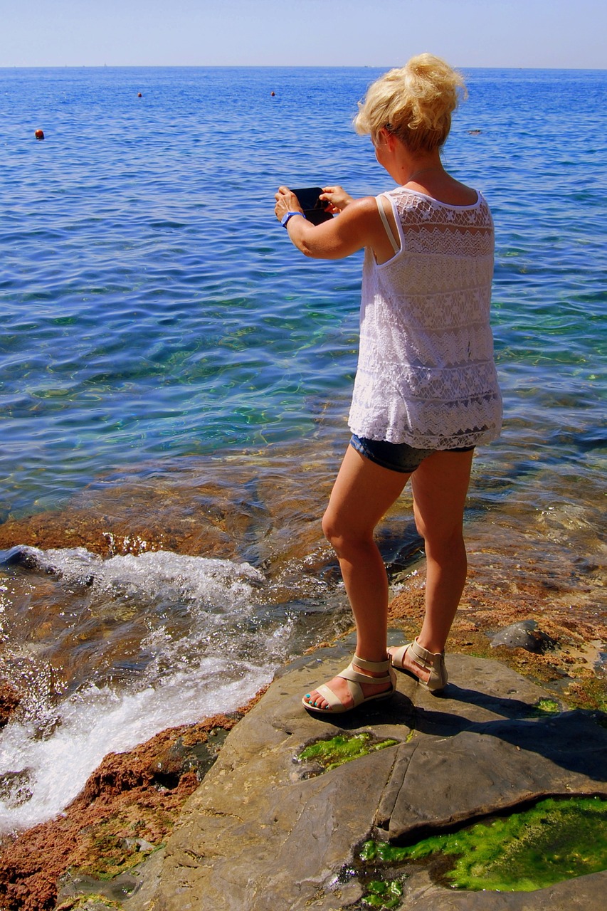 photographer rocks woman free photo