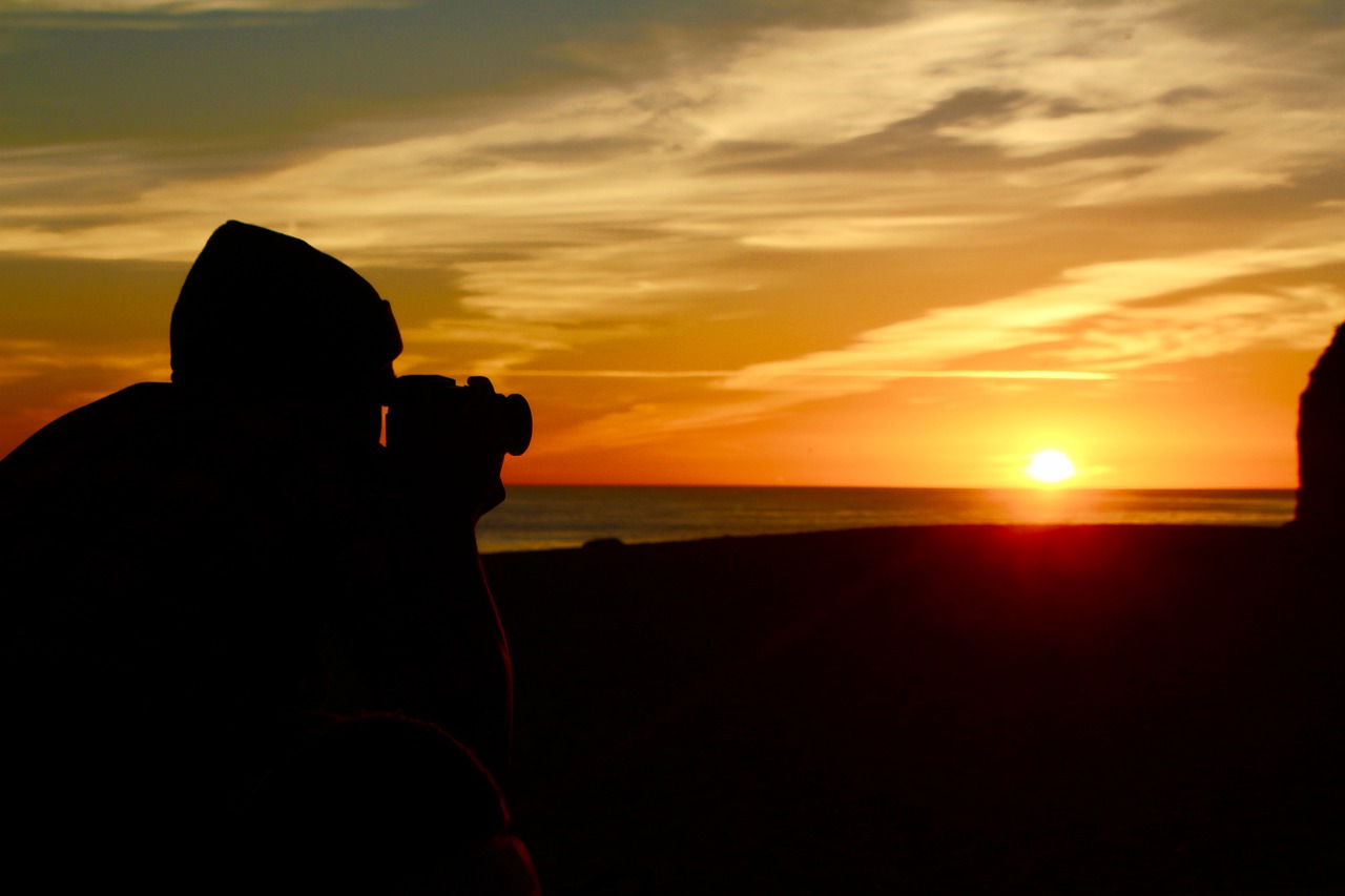 photographer  shadow  sunset free photo