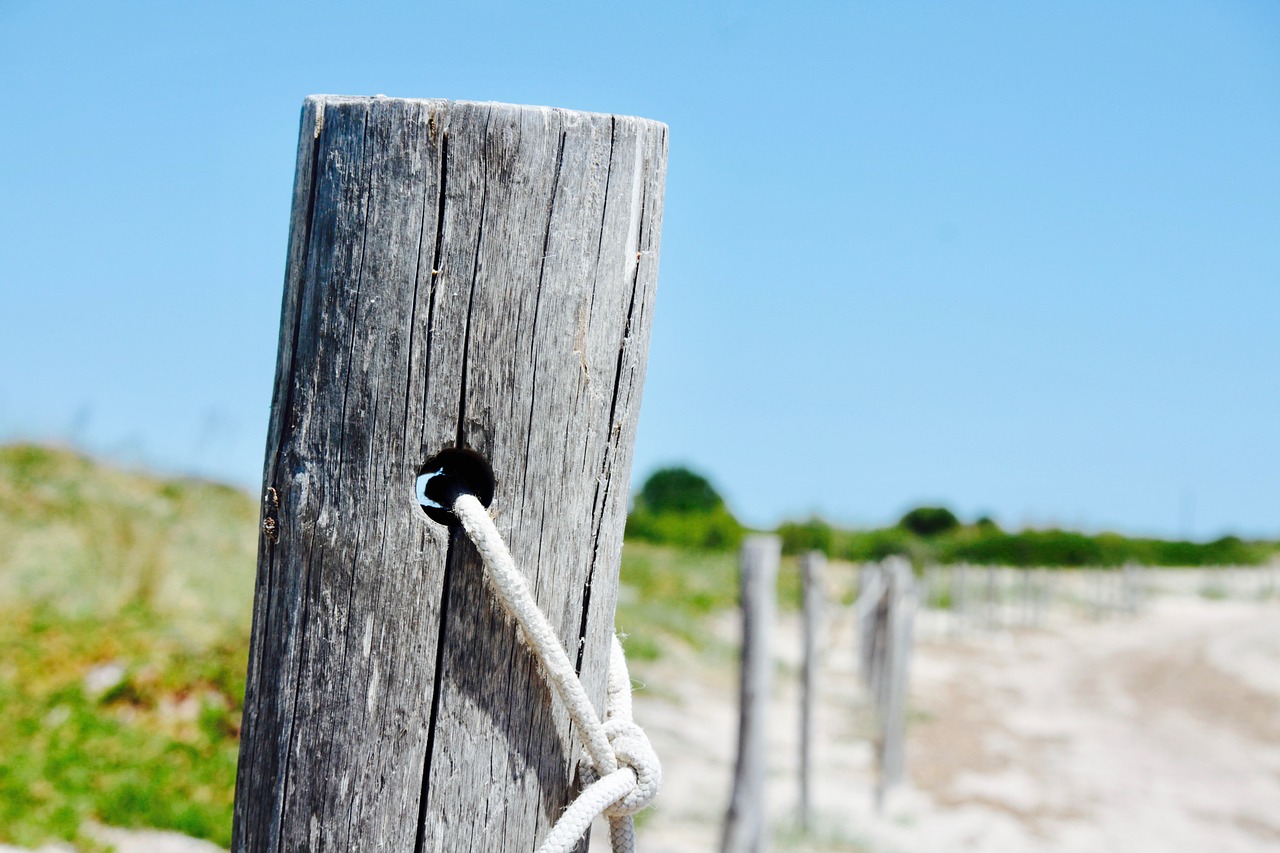 picket fence sand beach free photo