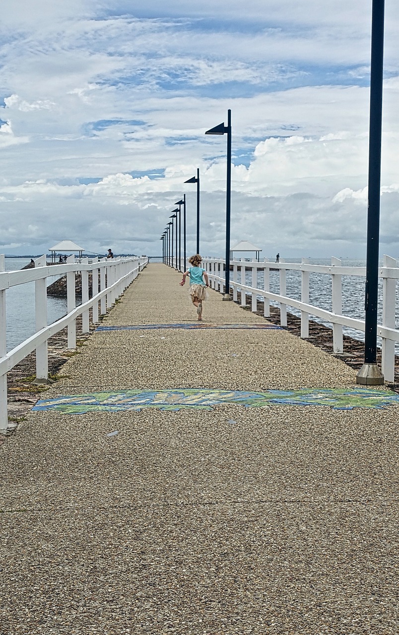 pier running child free photo