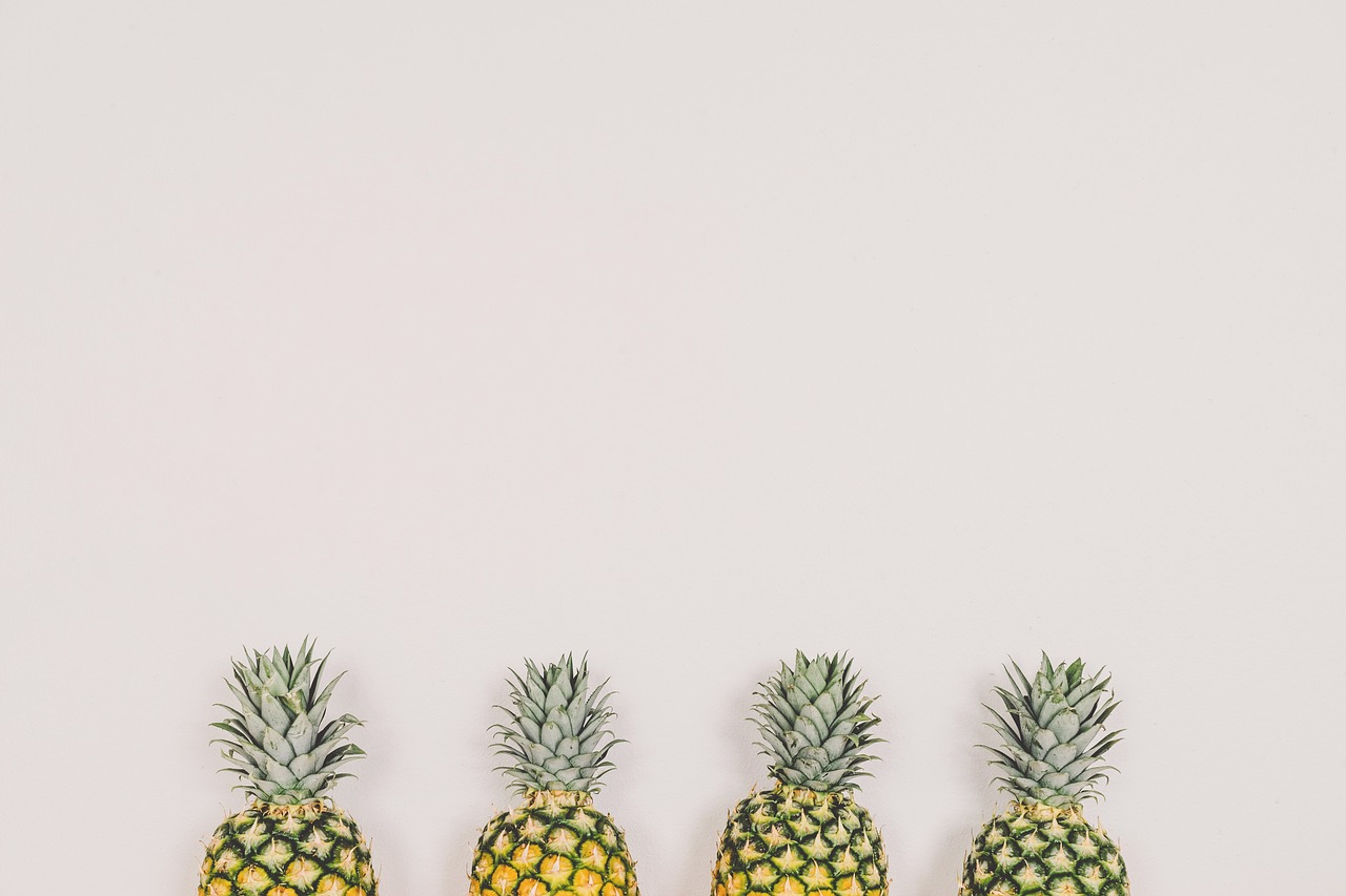 pineapples fruit white background free photo