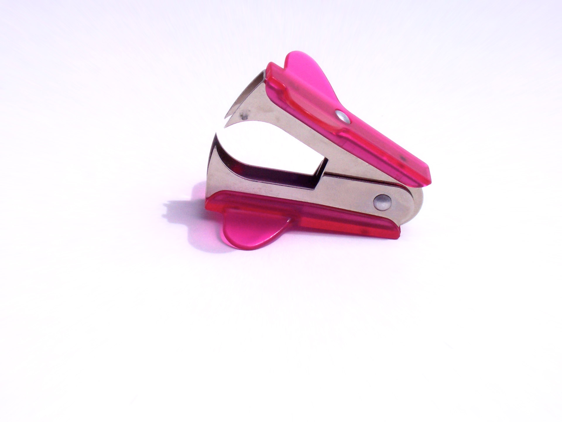 pink staple remover free photo