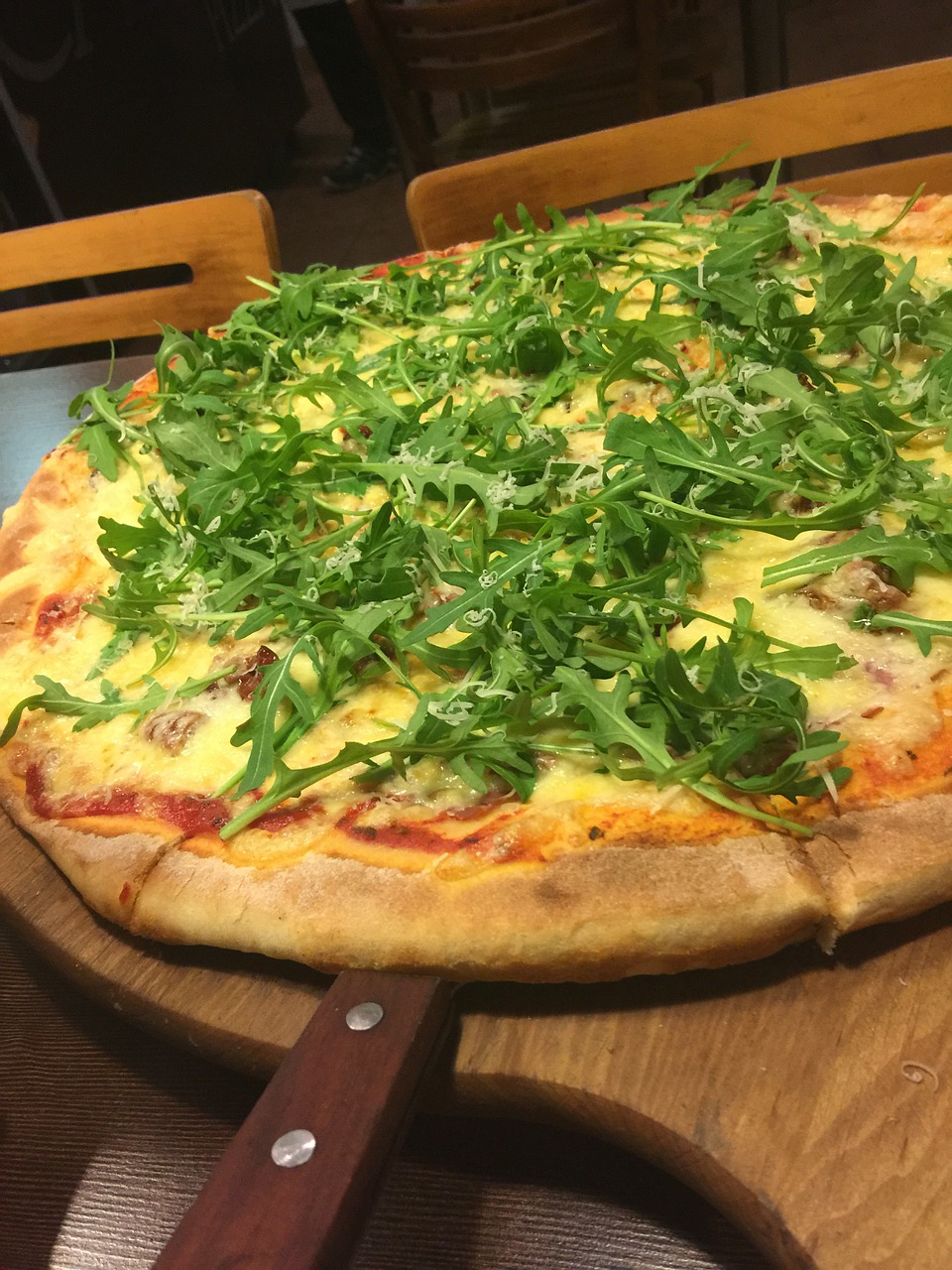 pizza arugula dish free photo