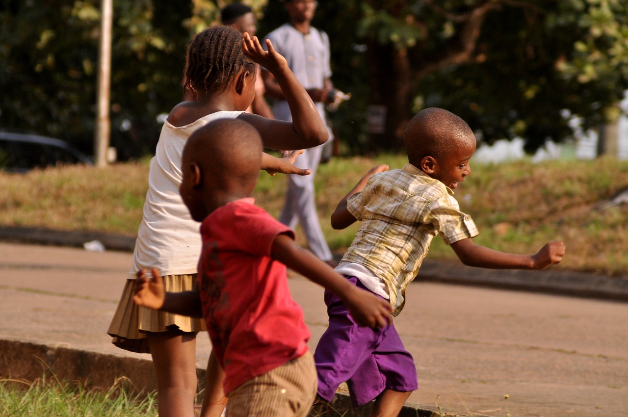 play african children run free photo