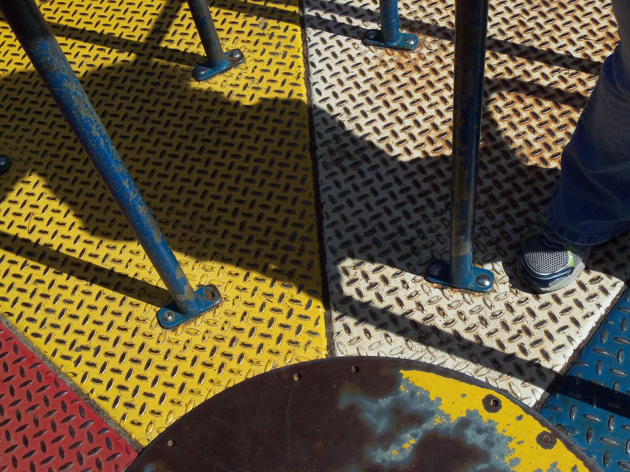 playground rusted merry-go-round free photo