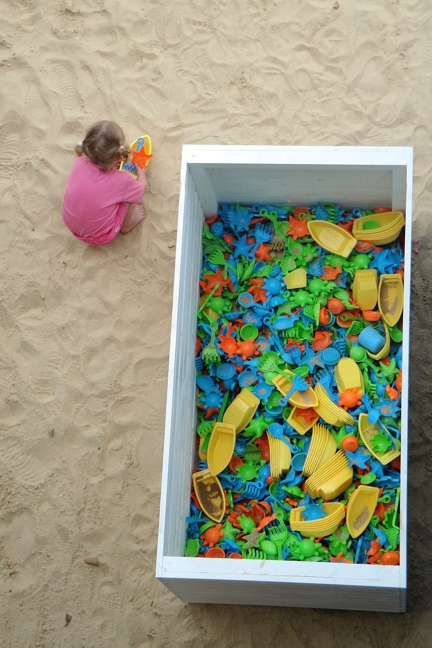 playing child sand sand toys free photo