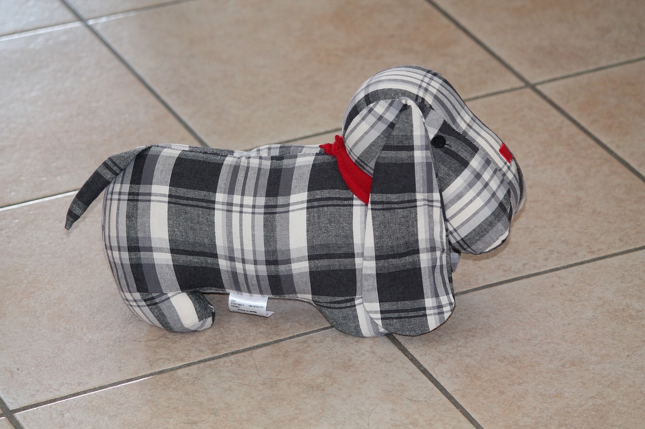 plush doggie doorstop free photo