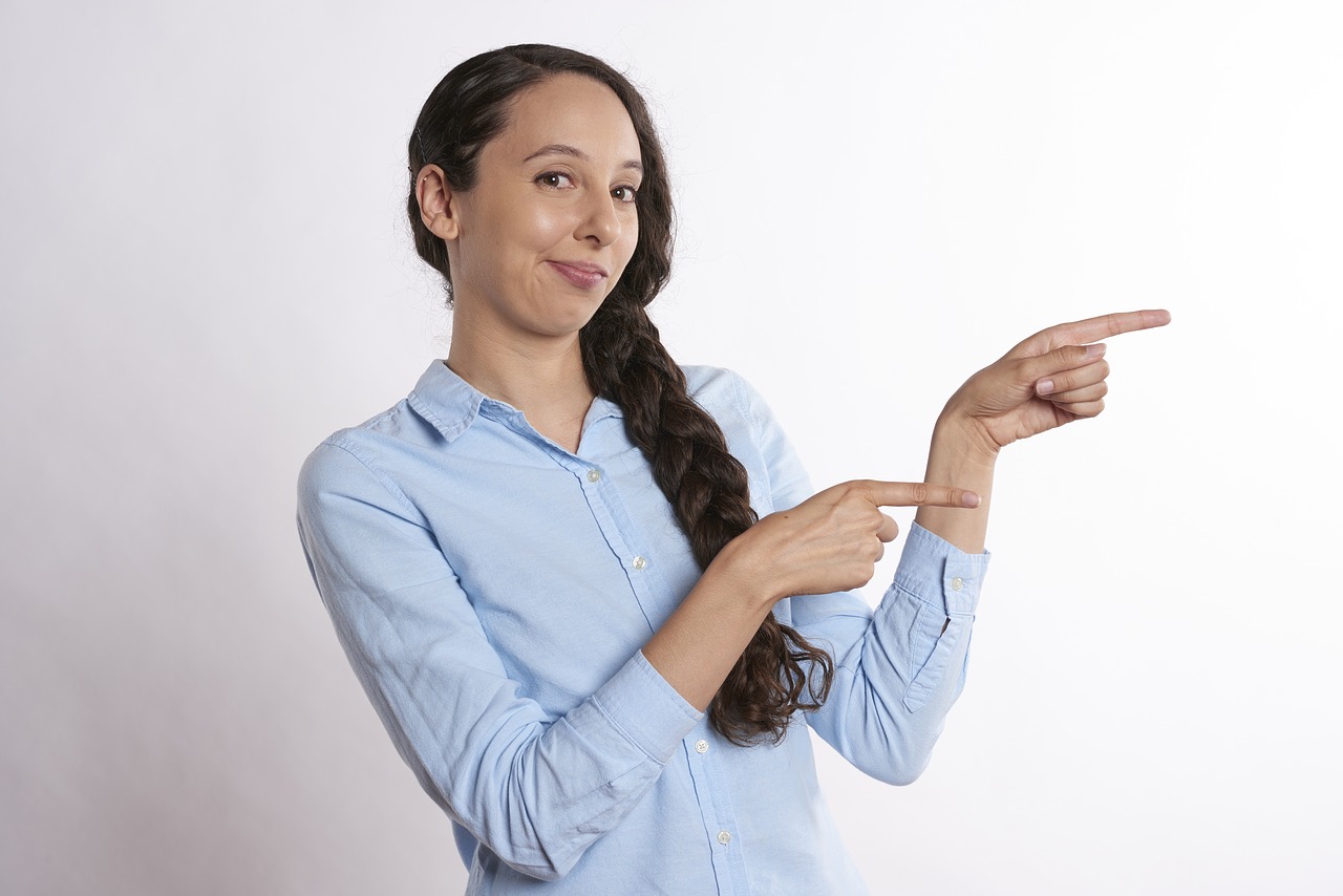 pointing showing woman free photo