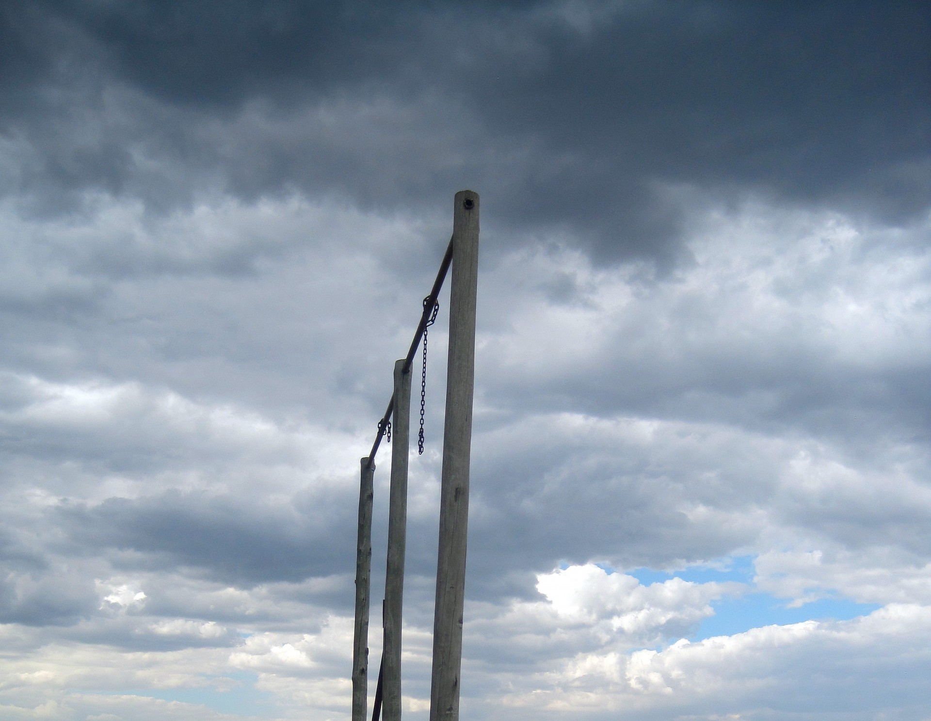 poles wooden chain free photo