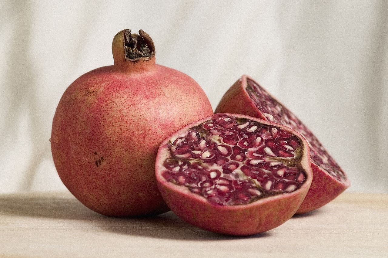 pomegranate fruit halved free photo