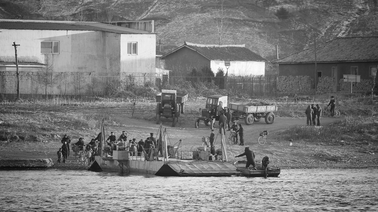 poor people yalu river north korea free photo
