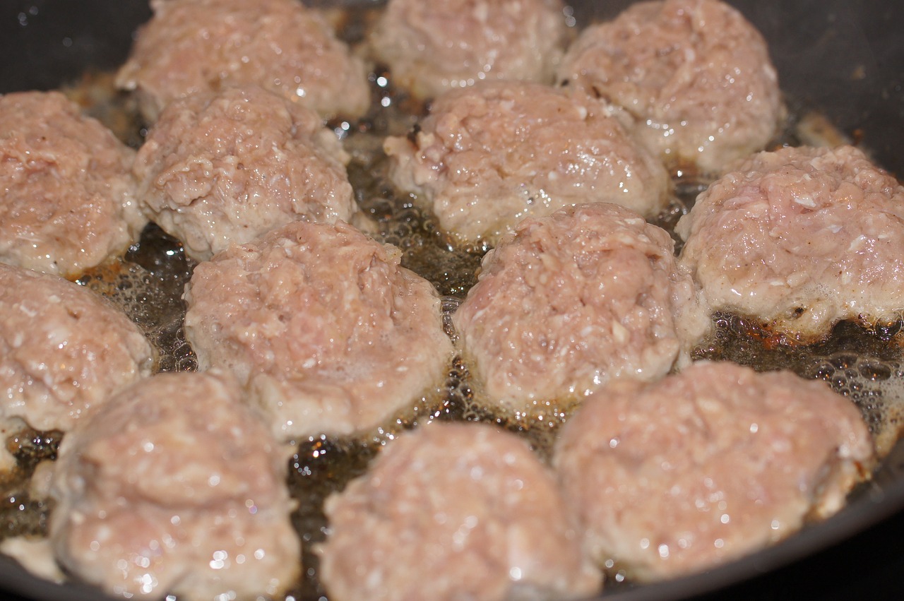 pork meatballs frying free photo
