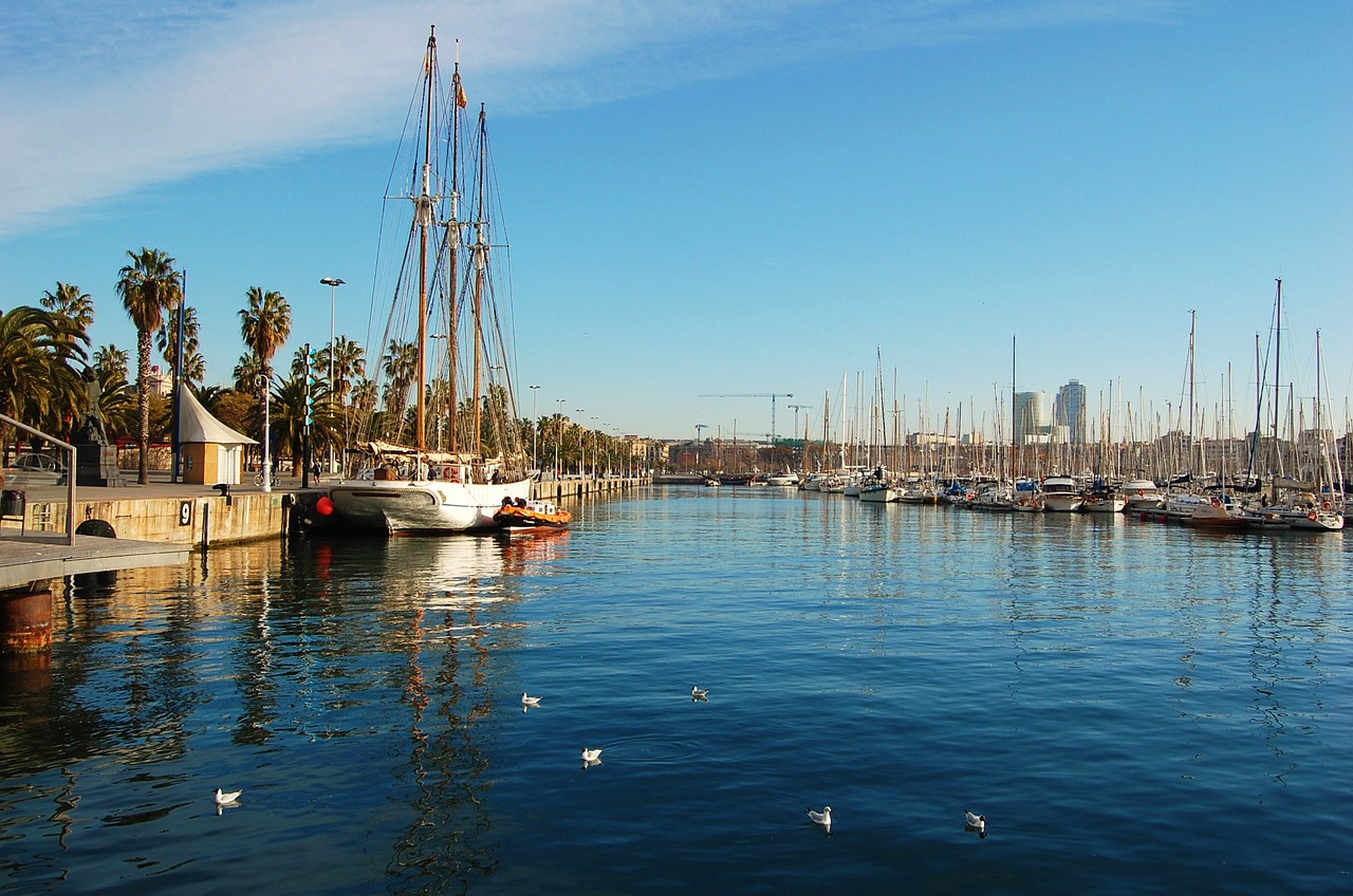 port of barcelona sailboat quiet morning free photo