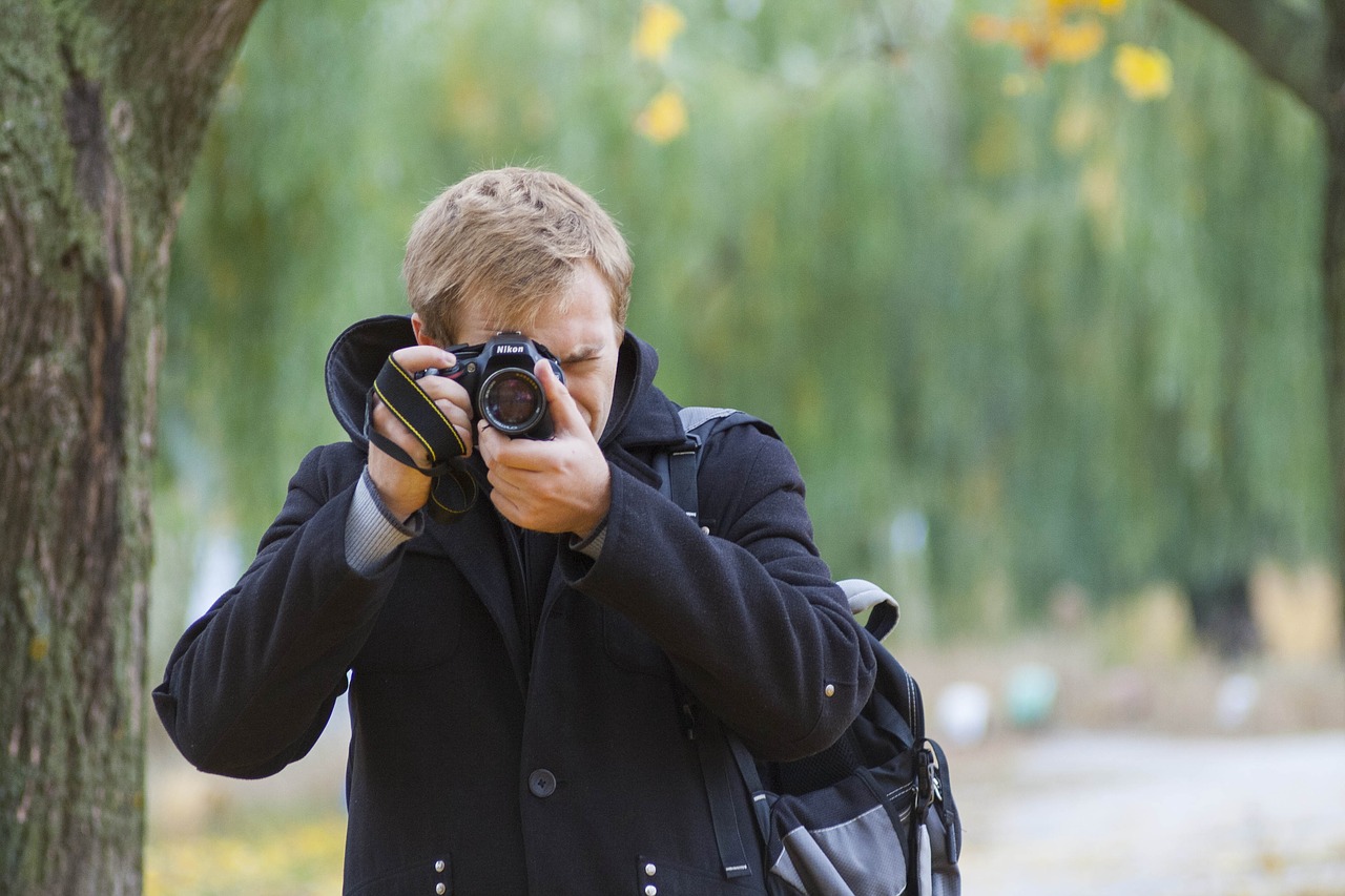 Парень с фотоаппаратом