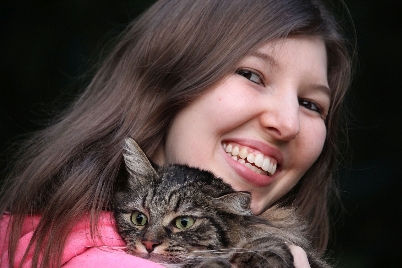 portrait young woman cat free photo