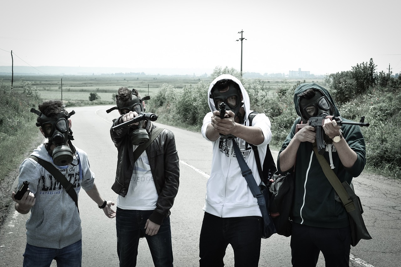 young people post apocalyptic gas mask free photo