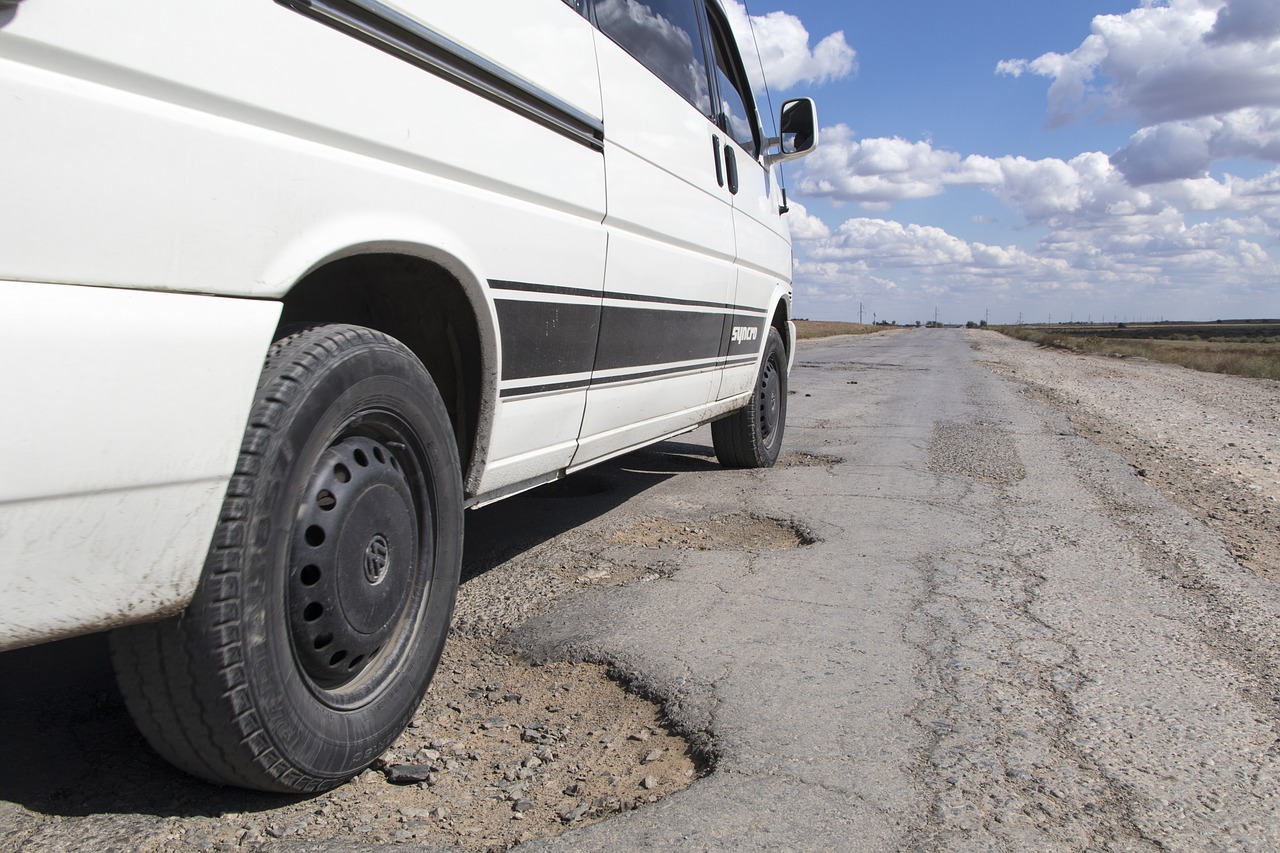 pothole road kazakhstan free photo