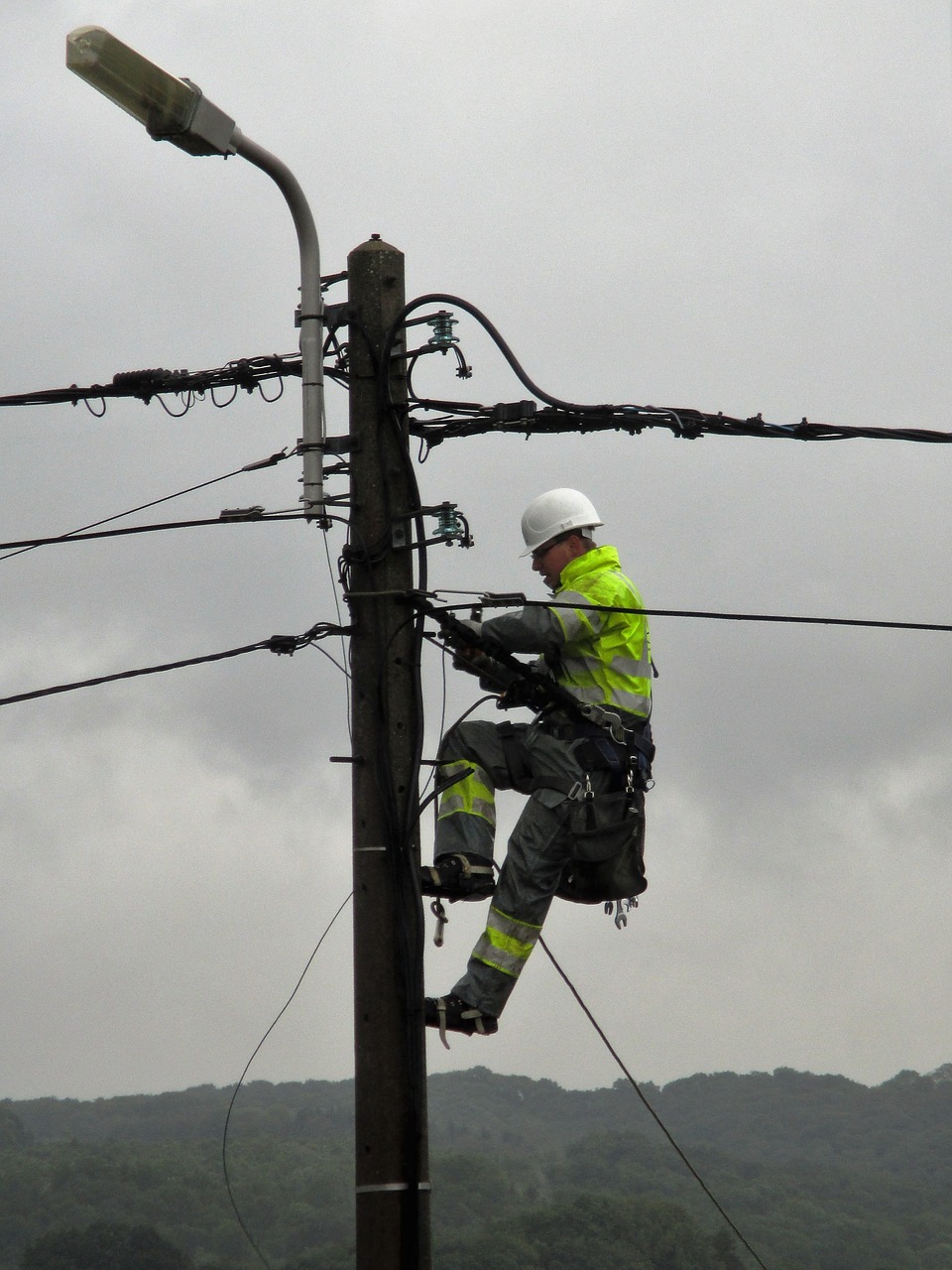 power pole worker electric wires free photo