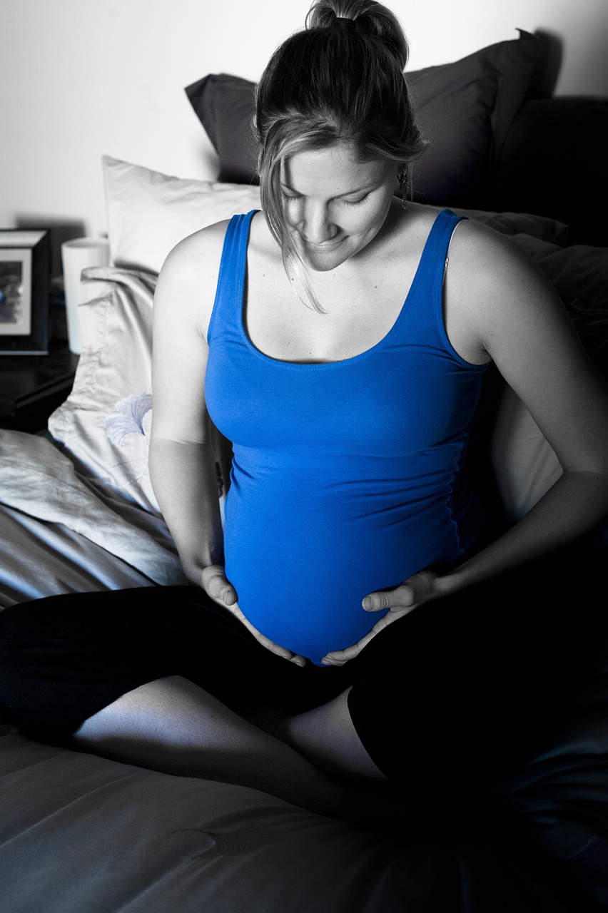 pregnant black white and blue touch belly free photo