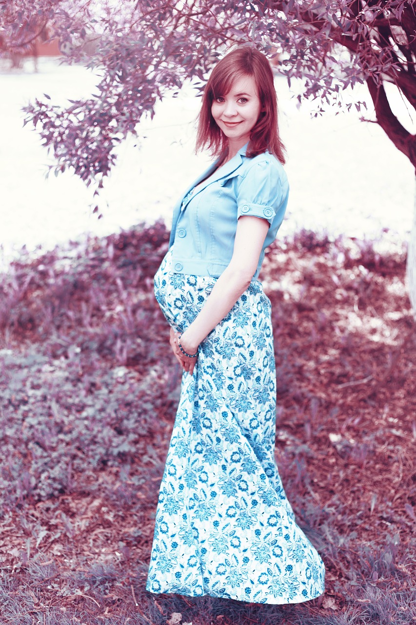 pregnant woman stand by free photo