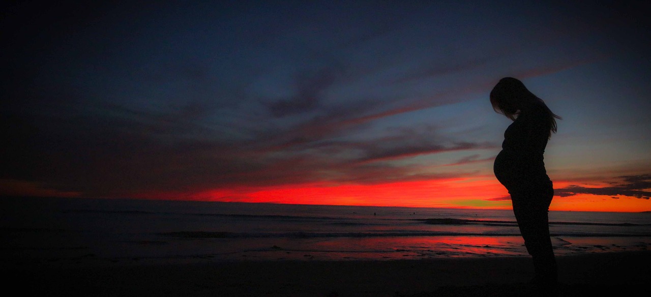 pregnant beach sunset free photo