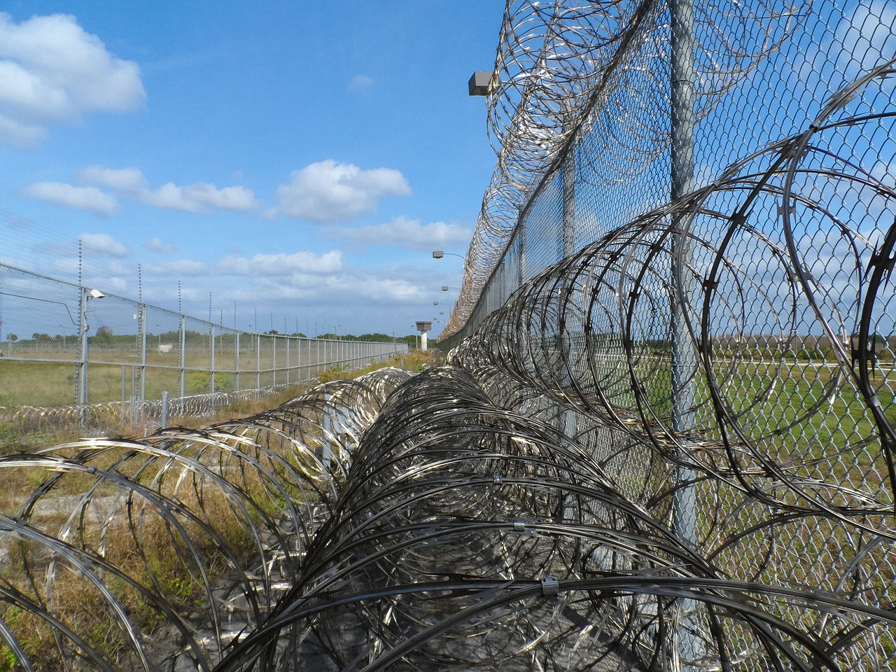 prison fence razor ribbon wire free photo