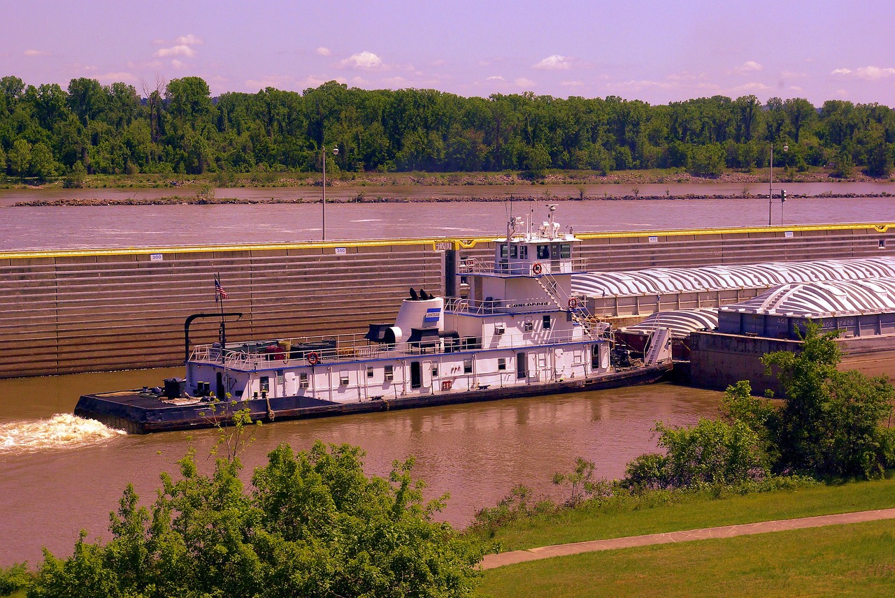 pushing downstream  tugboat  arkansas free photo