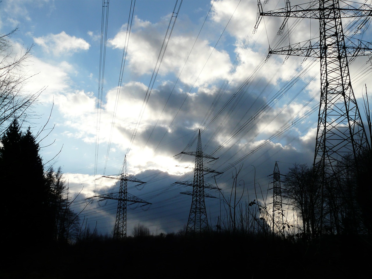 pylons power poles electricity free photo